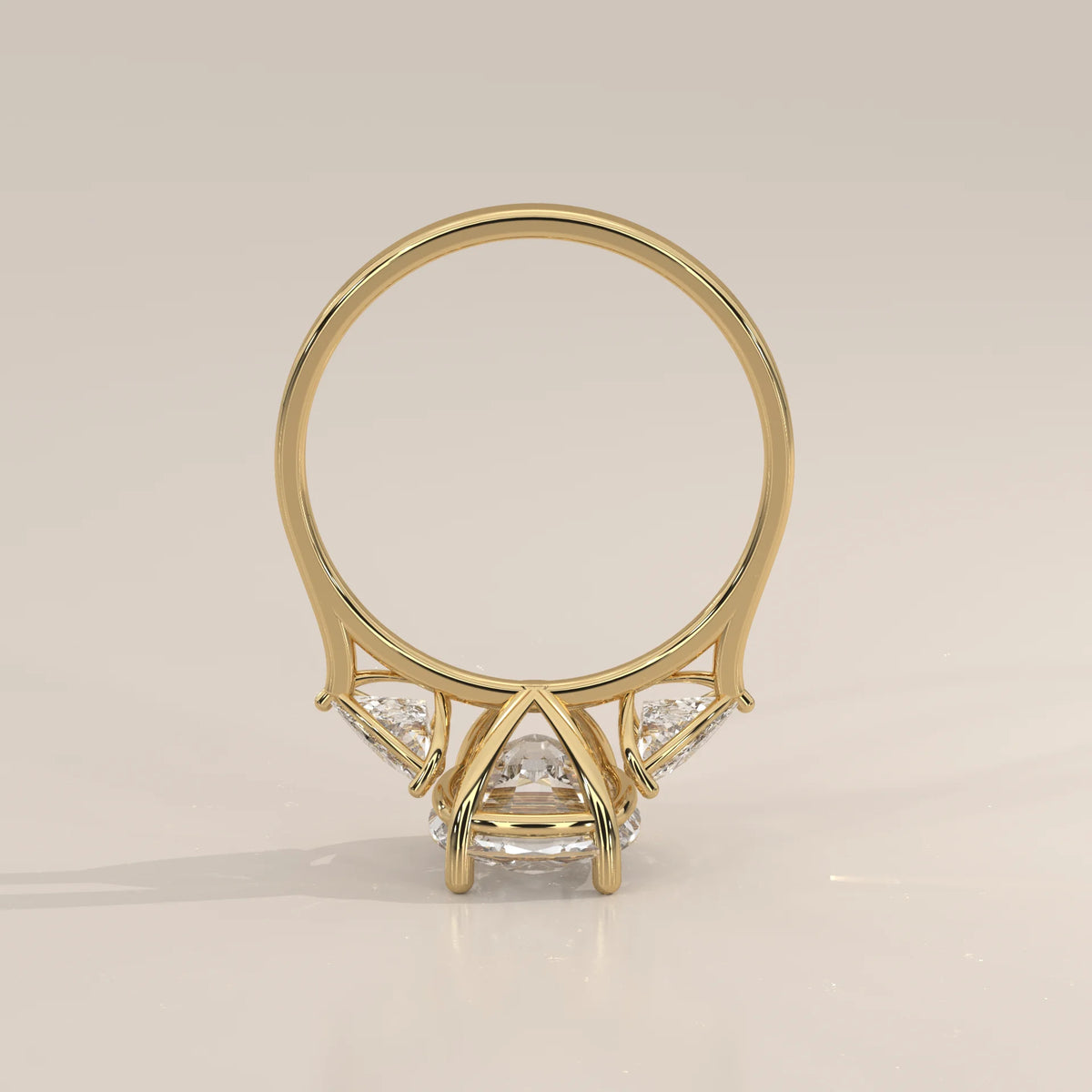 Mennie 5 Carat Cushion Lab Grown Diamond Ring, Trillion Sides in yellow gold, shown on a plain background.