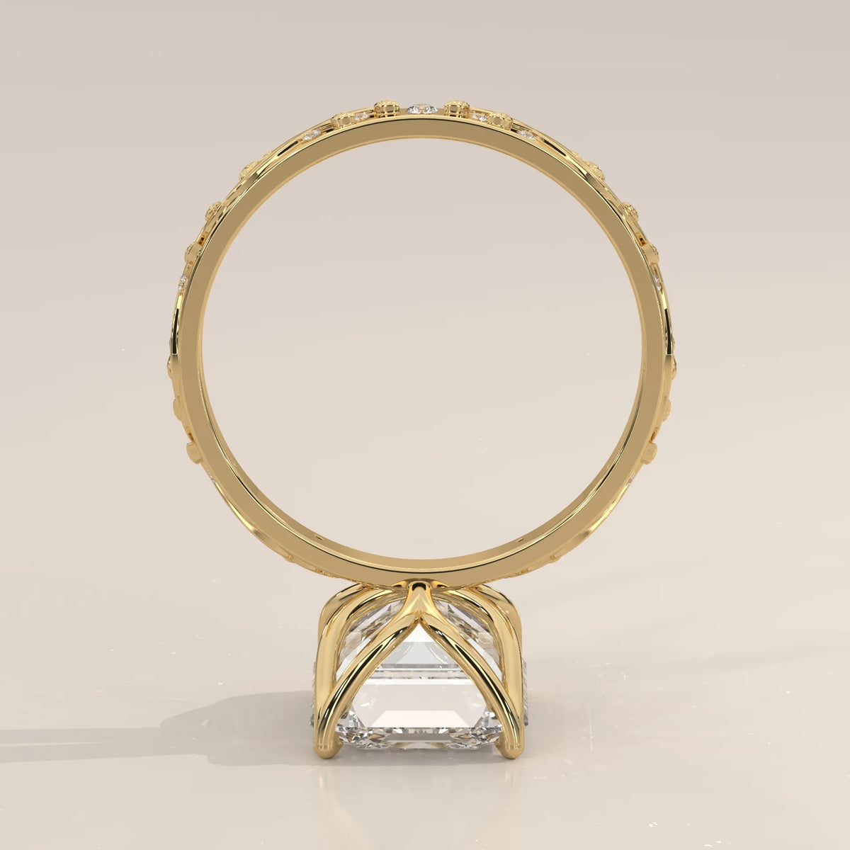 Miloise 5 Carat Emerald Cut Lab Grown Diamond Ring, Engraved Vine in yellow gold, side profile view.