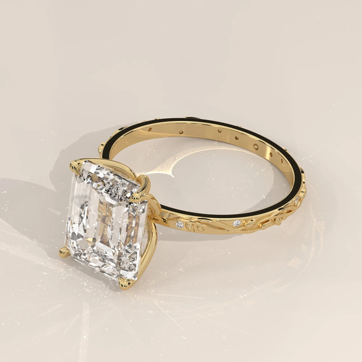 Miloise 5 Carat Emerald Cut Lab Grown Diamond Ring, Engraved Vine in yellow gold, shown from the side with the engraved vine band.