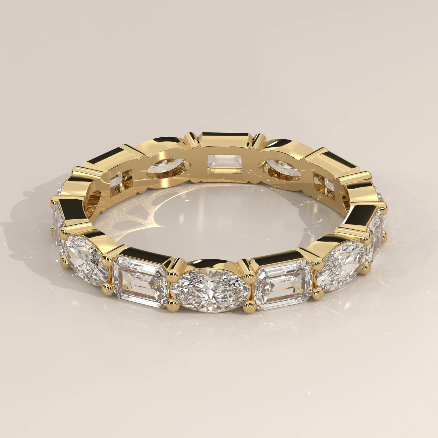 Angle View: Emerald Cut Diamond Eternity Band with Eternity Setting in Yellow Gold – Lab Grown – Driona Jewels