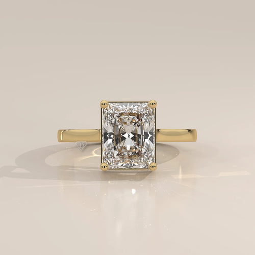 Nachel 5 Carat Radiant Lab Grown Diamond Solitaire Ring, Plain Band in yellow gold, photographed head-on.