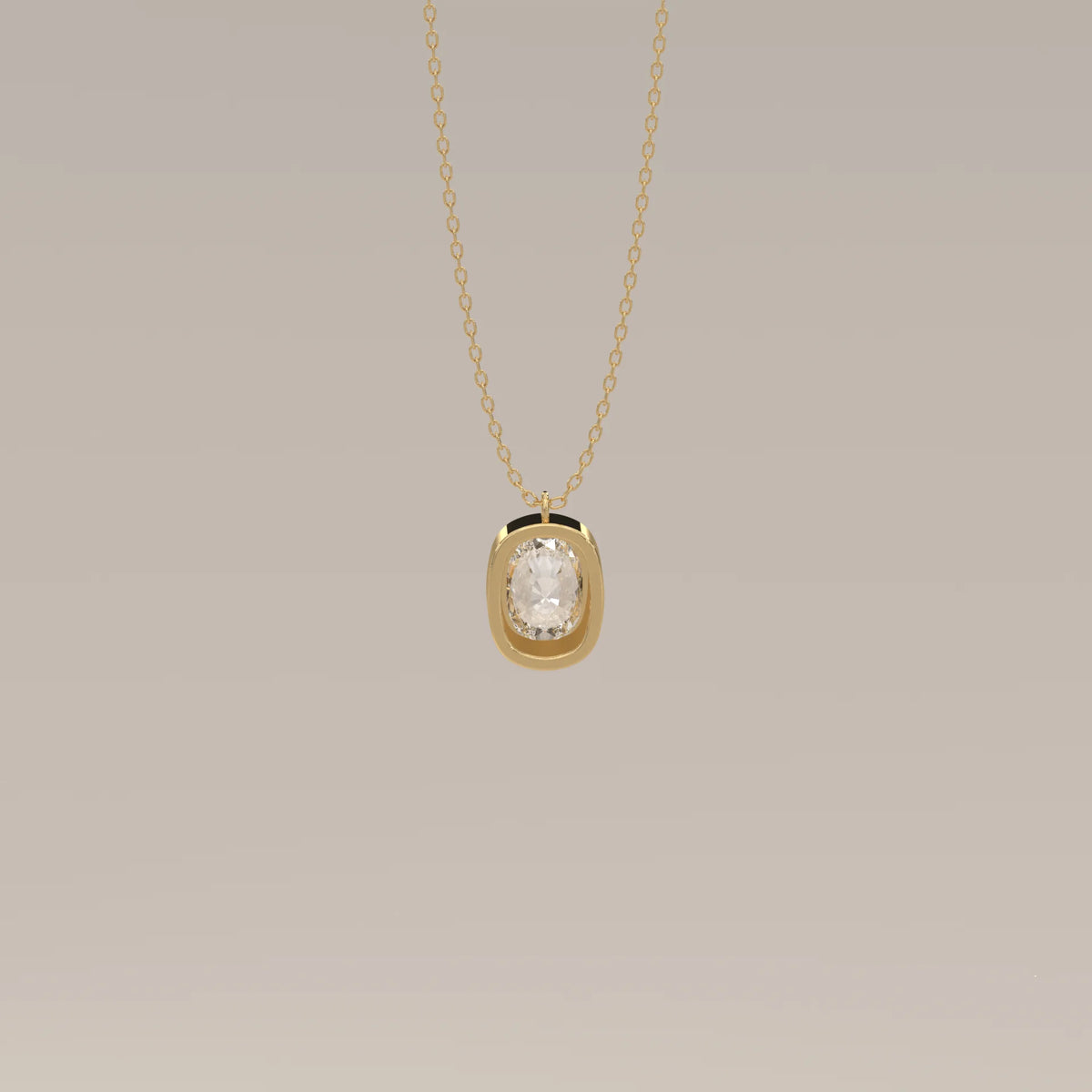 A delicate gold chain necklace with a cushion-cut gem pendant.