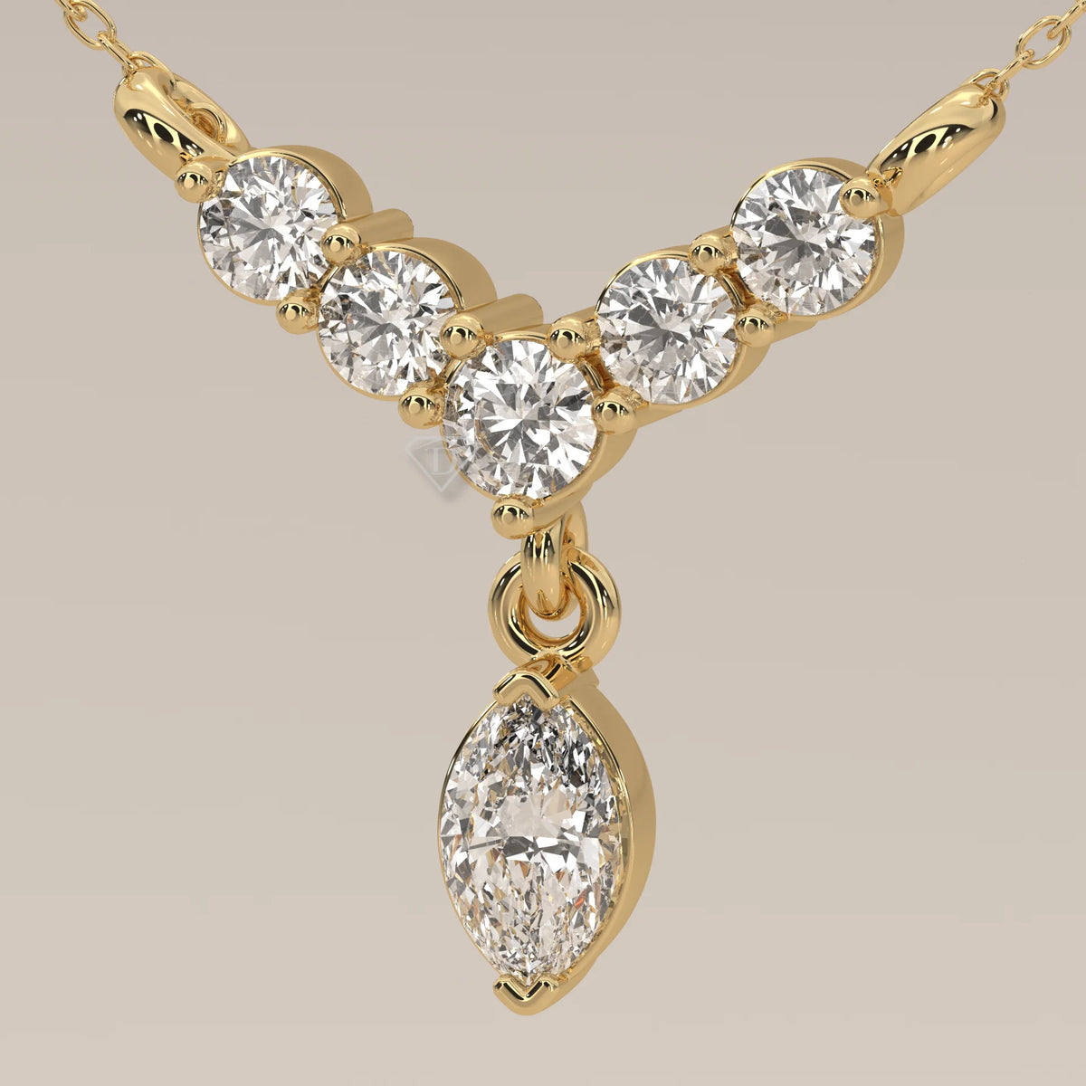 A delicate yellow gold necklace with five round diamonds and a marquise diamond pendant.