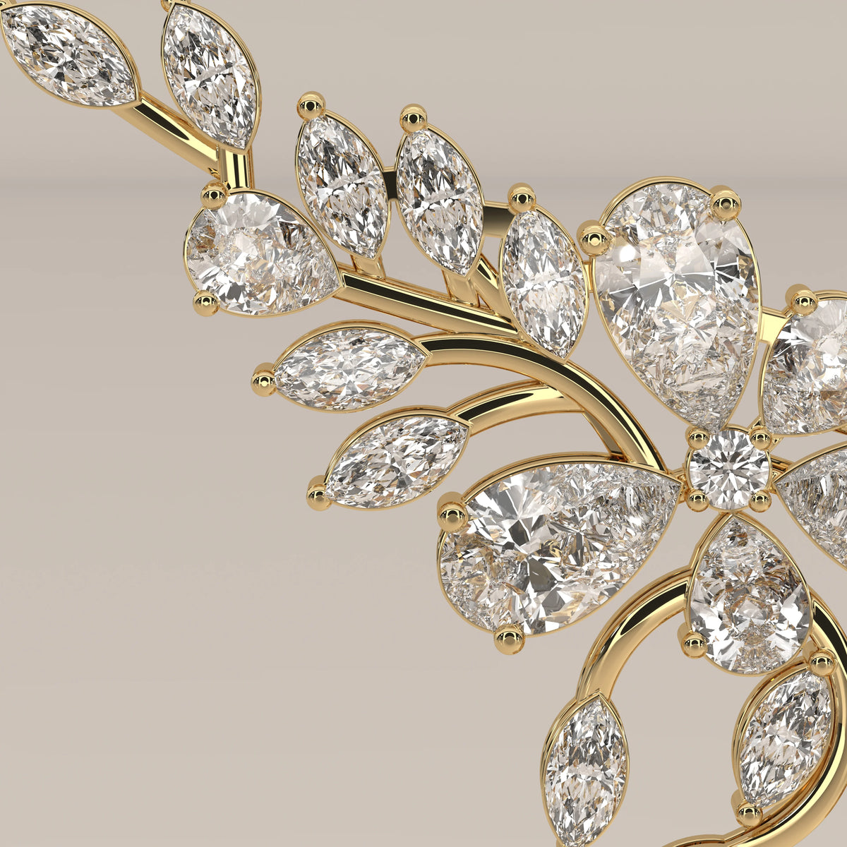A marquise and pear lab grown diamond leaf necklace in yellow gold, shown on a plain background.
