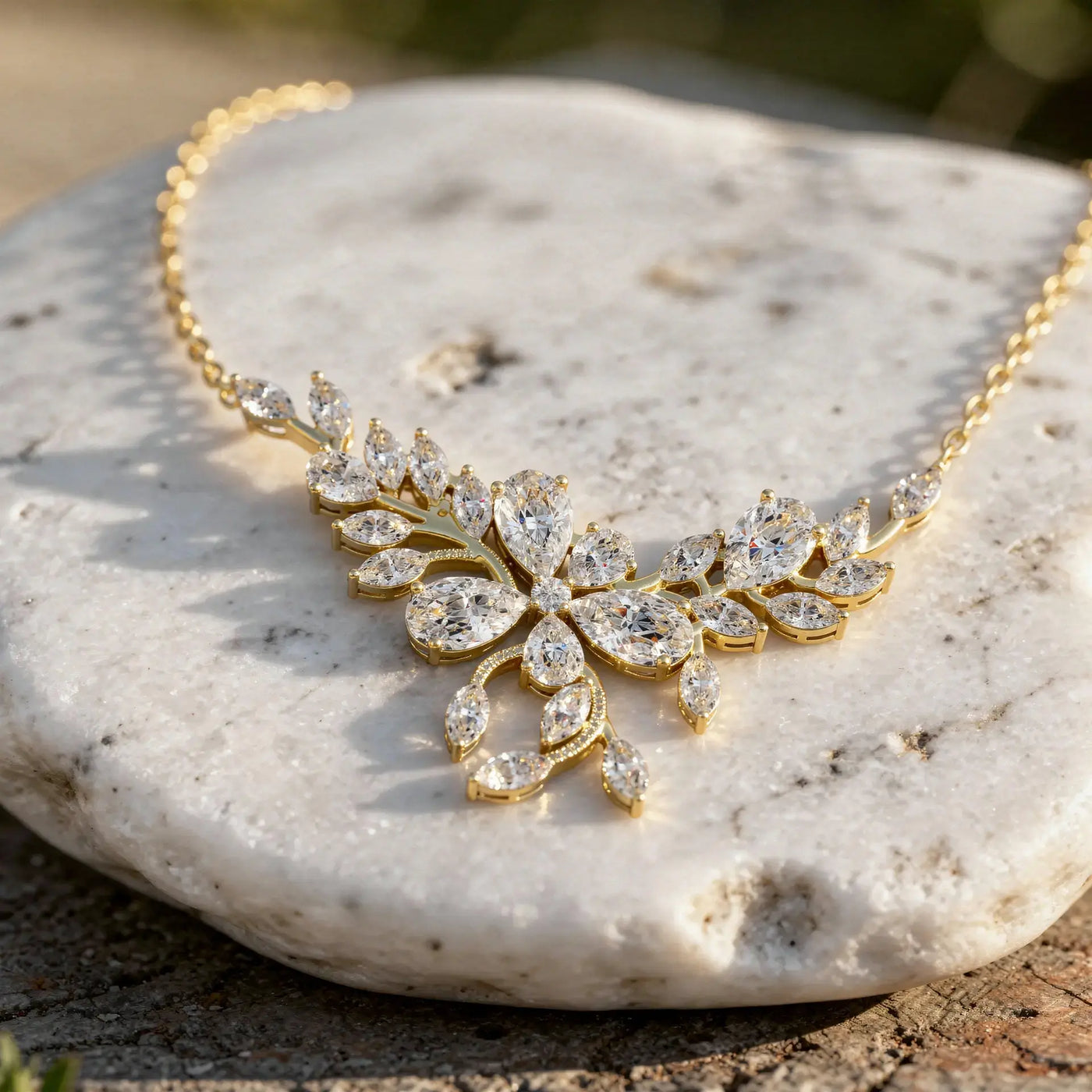 Flat Lay: Marquise Diamond Necklace with Floral Setting in 14k Yellow Gold - Lab Grown - Driona Jewels