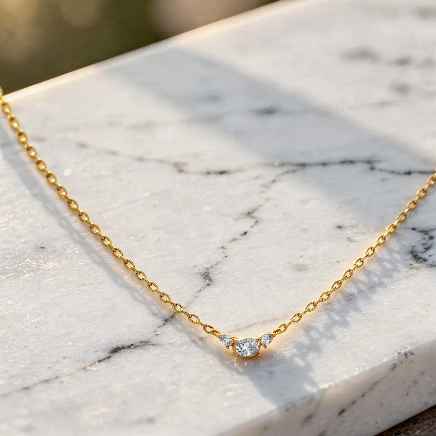Flat Lay: Round Diamond Necklace with Bezel Setting in 14k Yellow Gold - Lab Grown - Driona Jewels