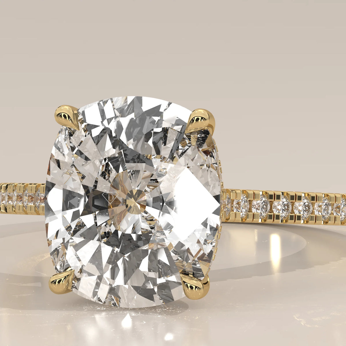 Olive 5 Carat Cushion Lab Grown Diamond Ring, Hidden Halo Pave Band in yellow gold, product photograph on a plain background.