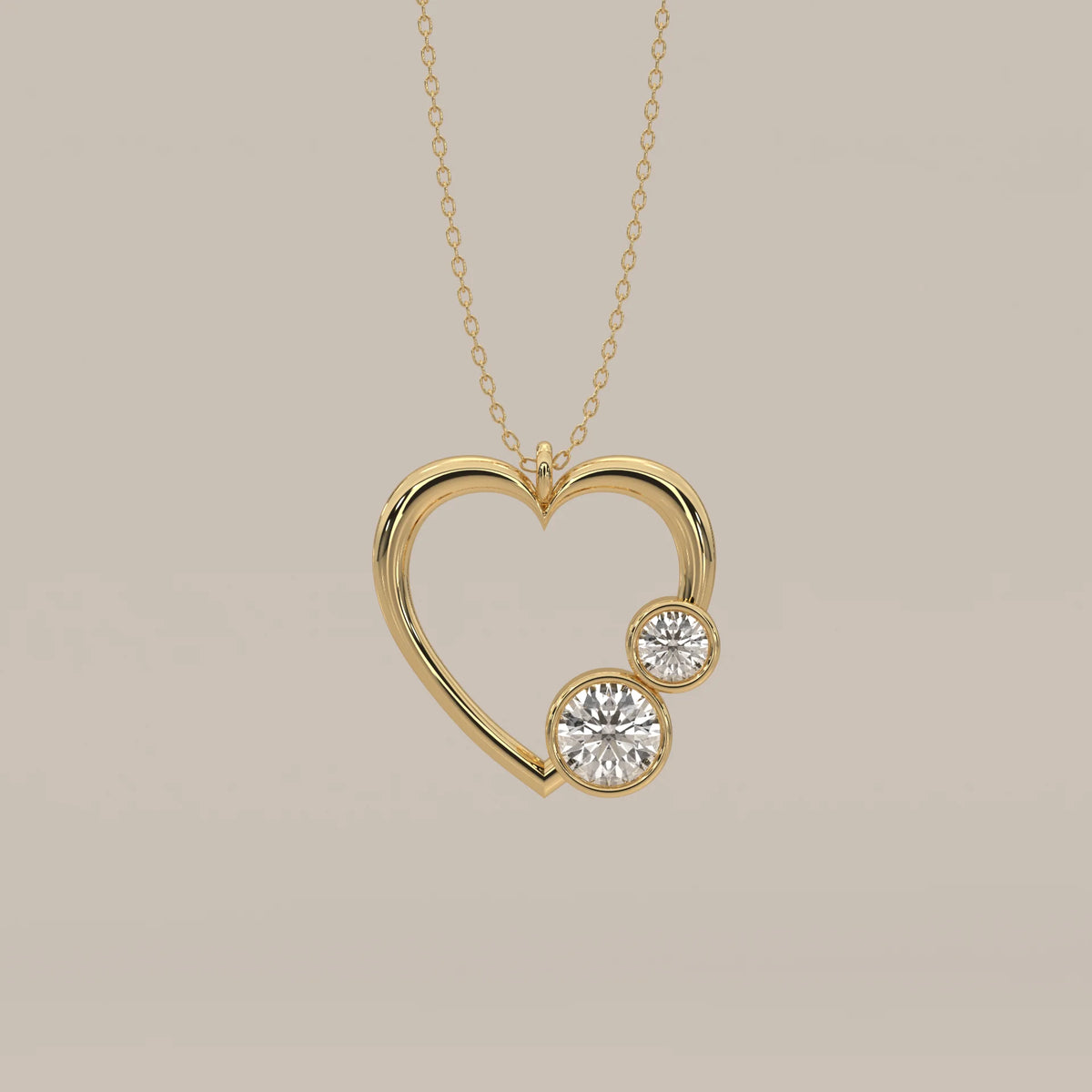 Open Heart Pendant with Two Bezel Round Lab Grown Diamonds in yellow gold, shown from the front.