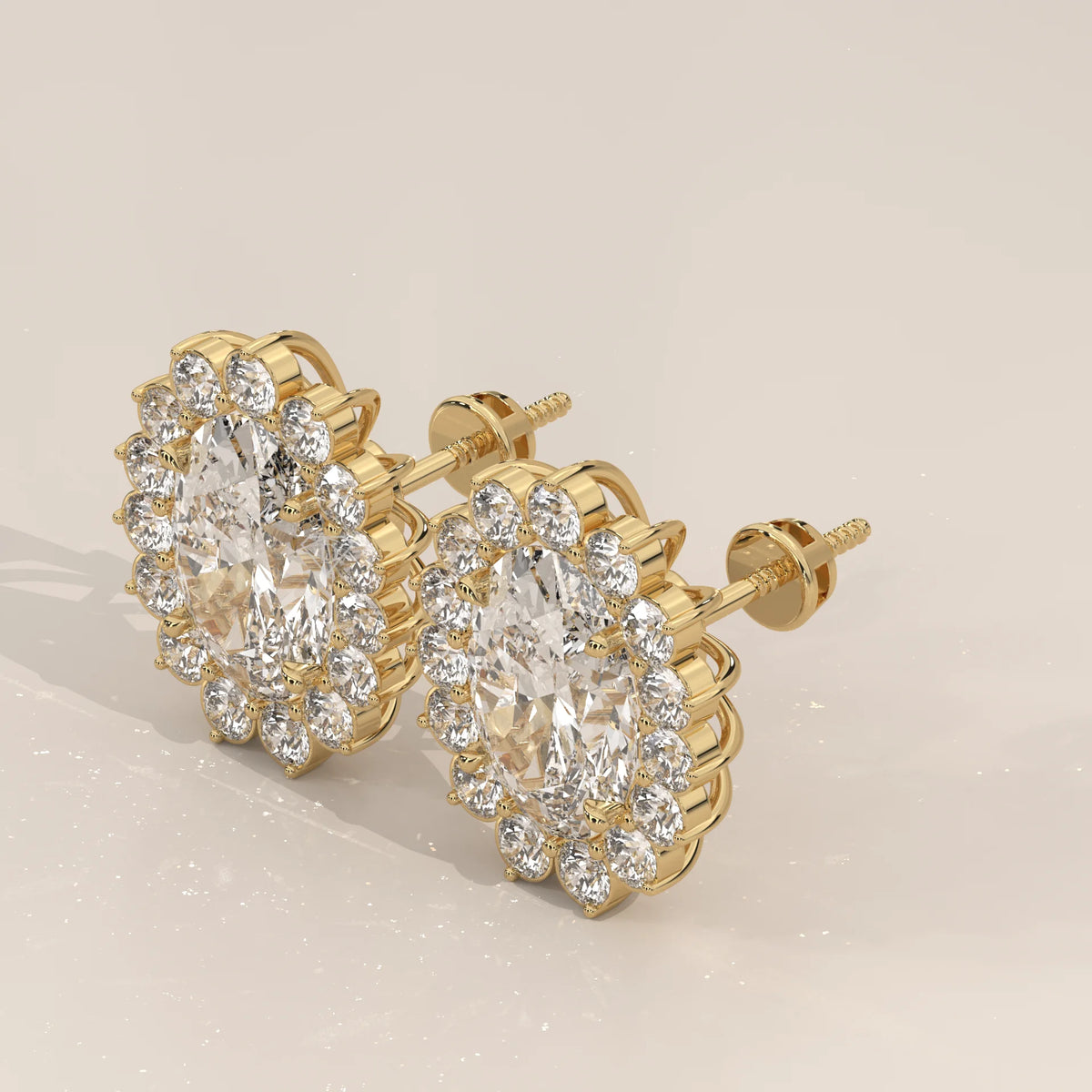 Oval Cluster Lab Grown Diamond Studs with Large Round Surround in yellow gold, photographed head-on.