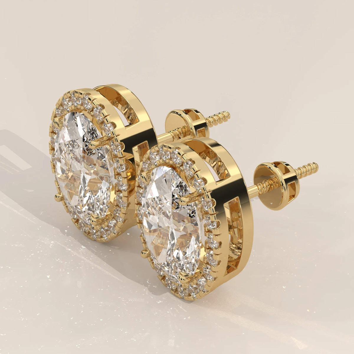 Oval Halo Lab Grown Diamond Stud Earrings with Screw Backs in yellow gold, shown on a plain background.
