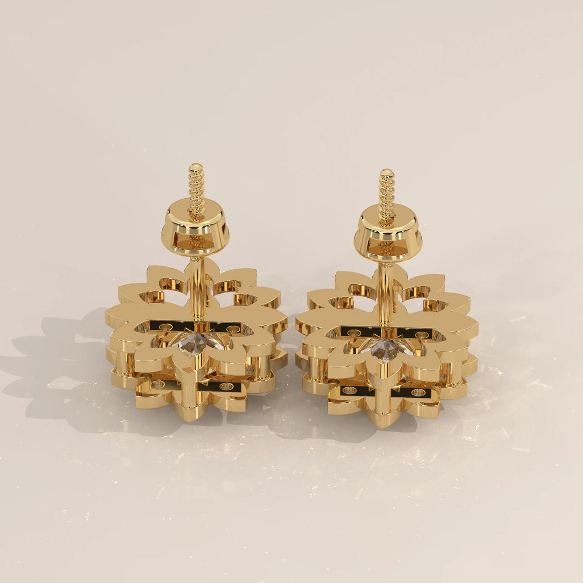 Oval Lab Grown Diamond Sunflower Halo Stud Earrings in yellow gold, studio photograph on a plain background.