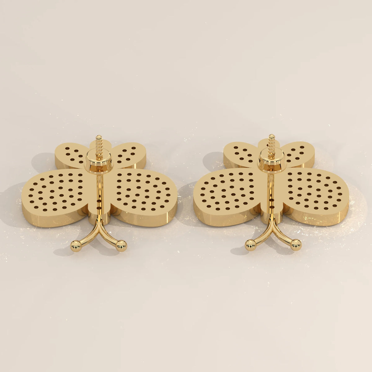 Pave Butterfly Lab Grown Diamond Stud Earrings with Swirl Wings in yellow gold, shown from the side.