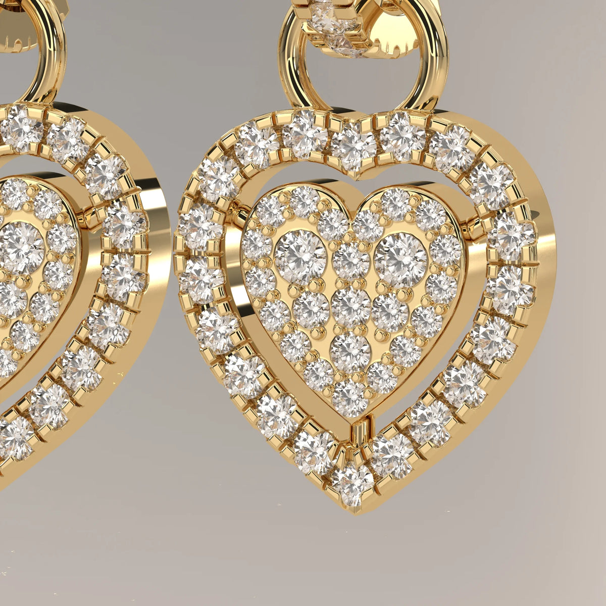 Pave Heart Lab Grown Diamond Drop Earrings on a Half Hoop Post in yellow gold, product photograph on a plain background.