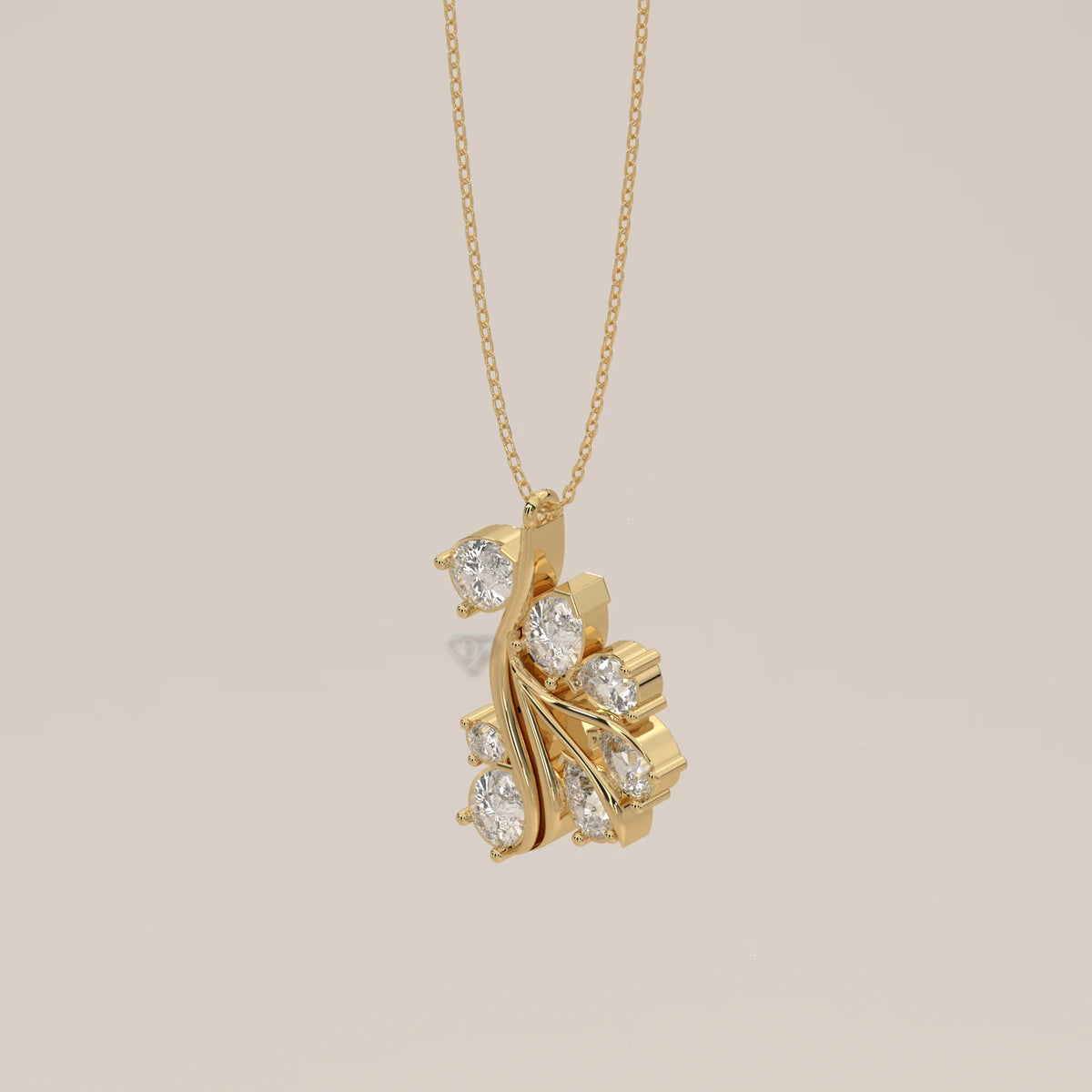 Pear Cluster Lab Grown Diamond Leaf Spray Pendant in yellow gold, photographed head-on.
