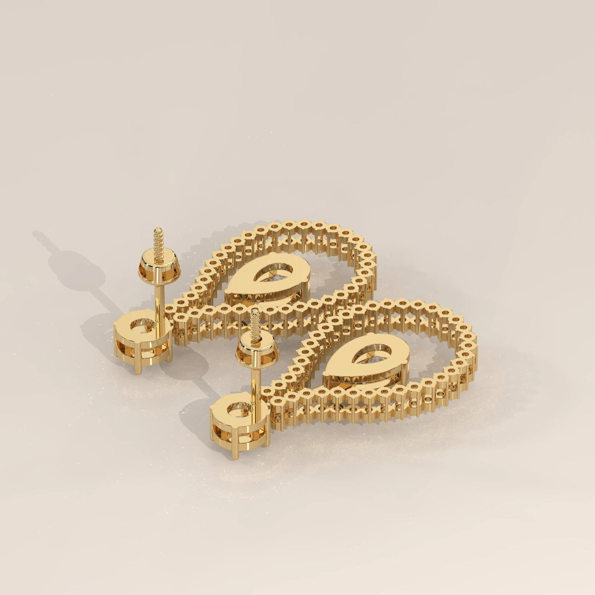 Pear Drop Lab Grown Diamond Earrings in an Open Teardrop Frame in yellow gold, shown at an angle.