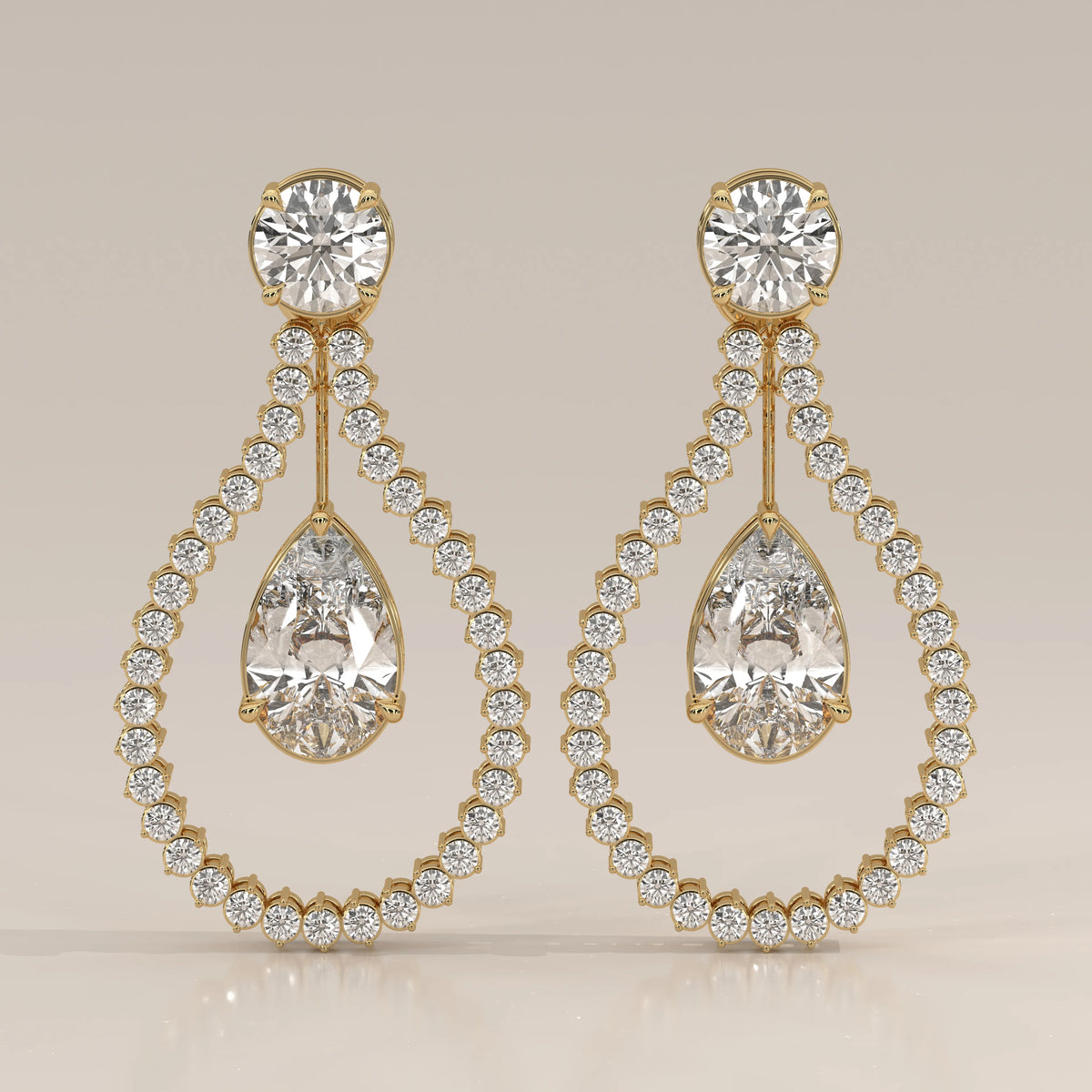 Pear Drop Lab Grown Diamond Earrings in an Open Teardrop Frame in yellow gold, shown from the front.