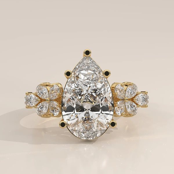 Side Profile: Pear Diamond Engagement Ring with Cluster Setting in Yellow Gold – Lab Grown – Driona Jewels