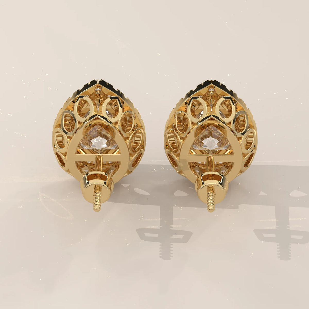Pear Halo Lab Grown Diamond Studs with Teardrop Cut Out Gallery in yellow gold, shown on a plain background.