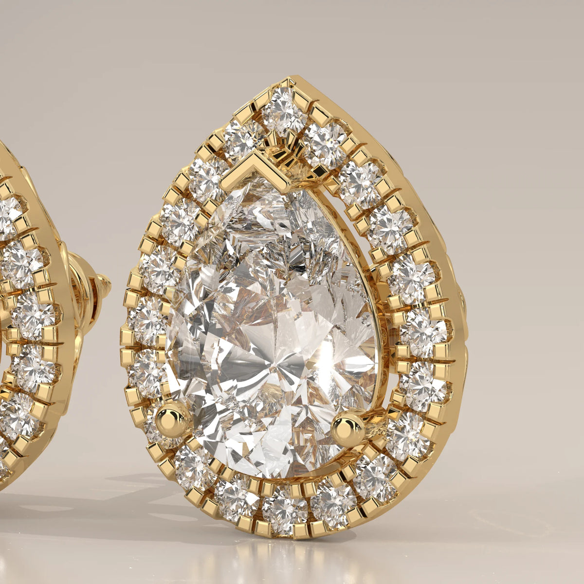 Pear Halo Lab Grown Diamond Studs with Teardrop Cut Out Gallery in yellow gold, side profile view.