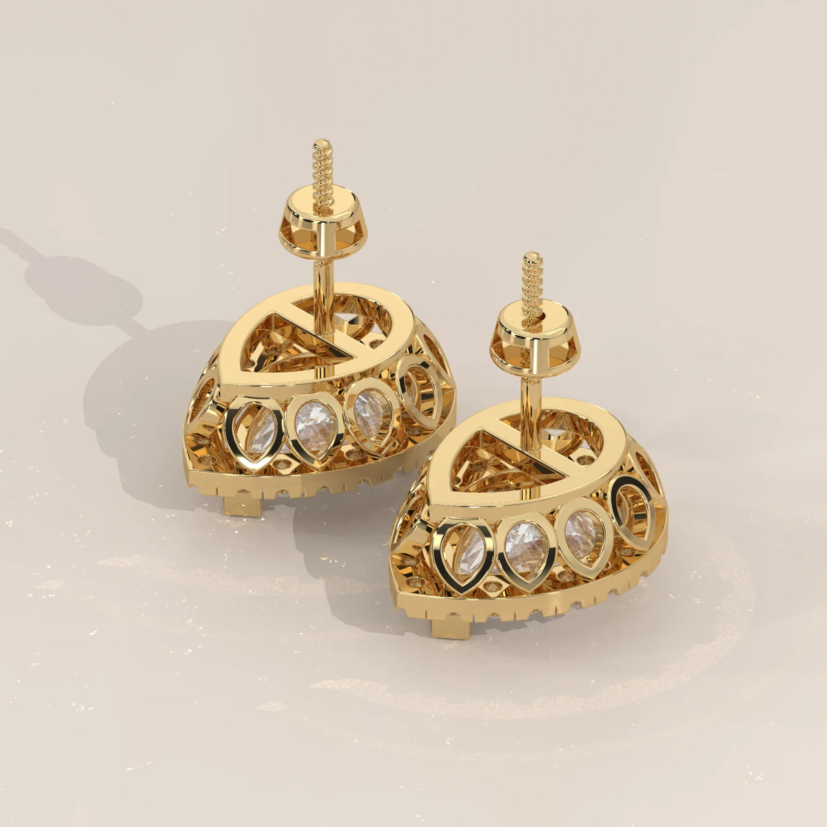 Pear Halo Lab Grown Diamond Studs with Teardrop Cut Out Gallery in yellow gold, photographed from the side.