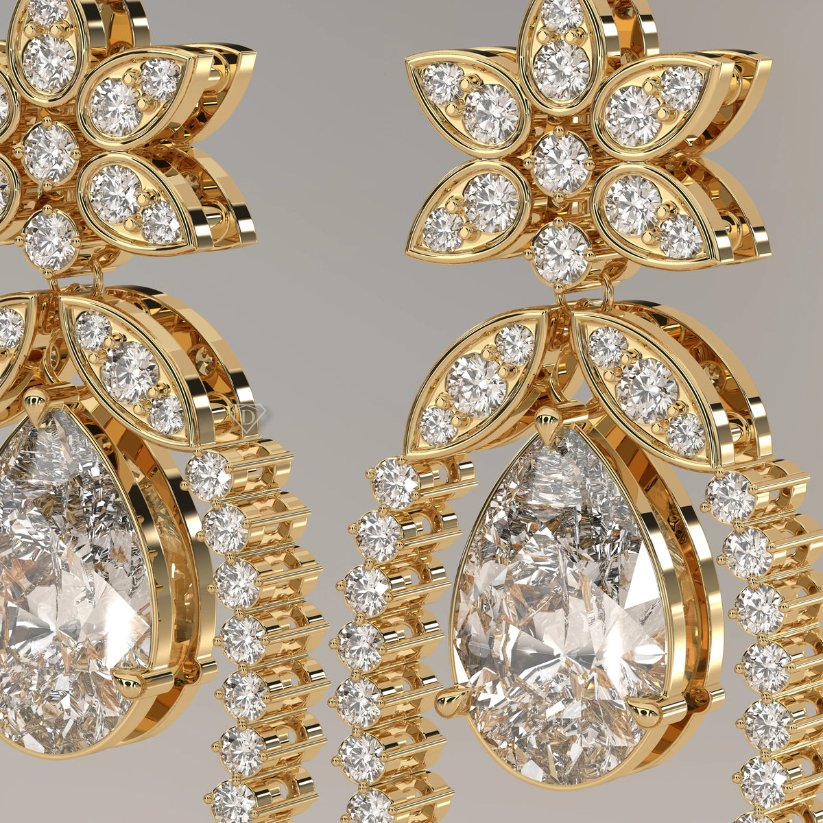 Pear Lab Grown Diamond Chandelier Earrings with Pave Flower Top in yellow gold, shown on a plain background.