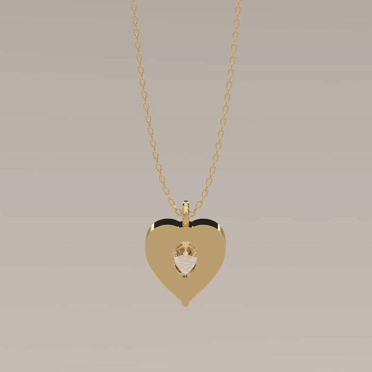 Pear Lab Grown Diamond Pendant Cradled in a Sculpted Heart Frame in yellow gold, photographed head-on.