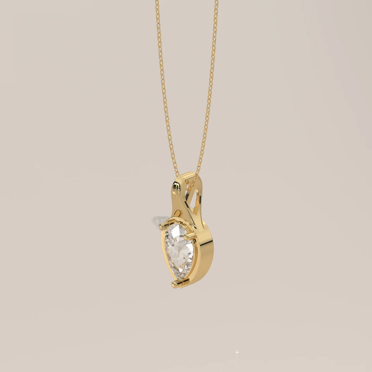 Pear Lab Grown Diamond Pendant in a Tapered Teardrop Frame in yellow gold, shown from the side.