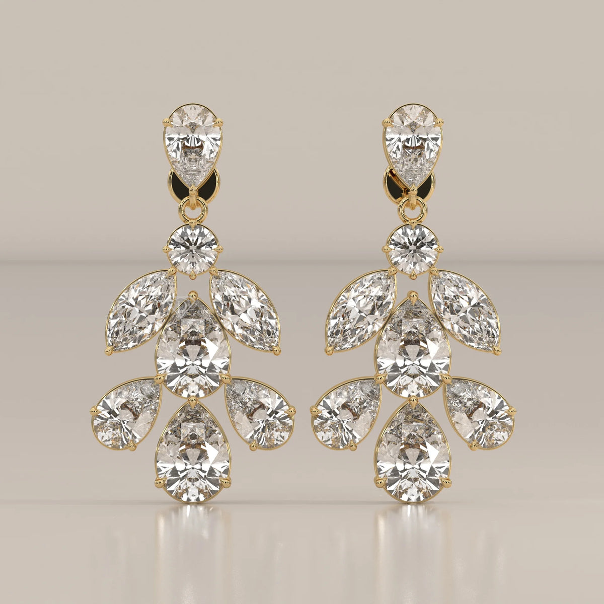 Pear and Marquise Lab Grown Diamond Leaf Cluster Drop Earrings in yellow gold, shown from the front.