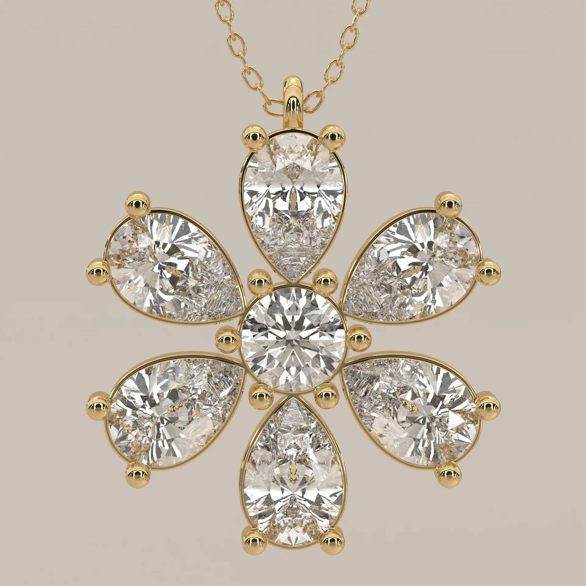 Pear Petal Lab Grown Diamond Flower Pendant with Round Centre in yellow gold, product photograph on a plain background.