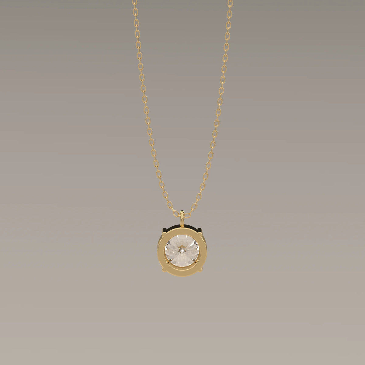 A delicate gold chain holding a pendant with a clear, round gemstone.