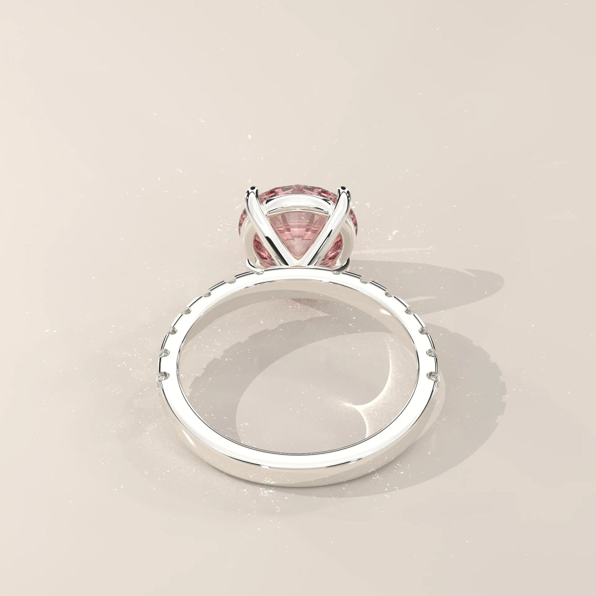 Back view of pink diamond engagement ring showing the basket setting