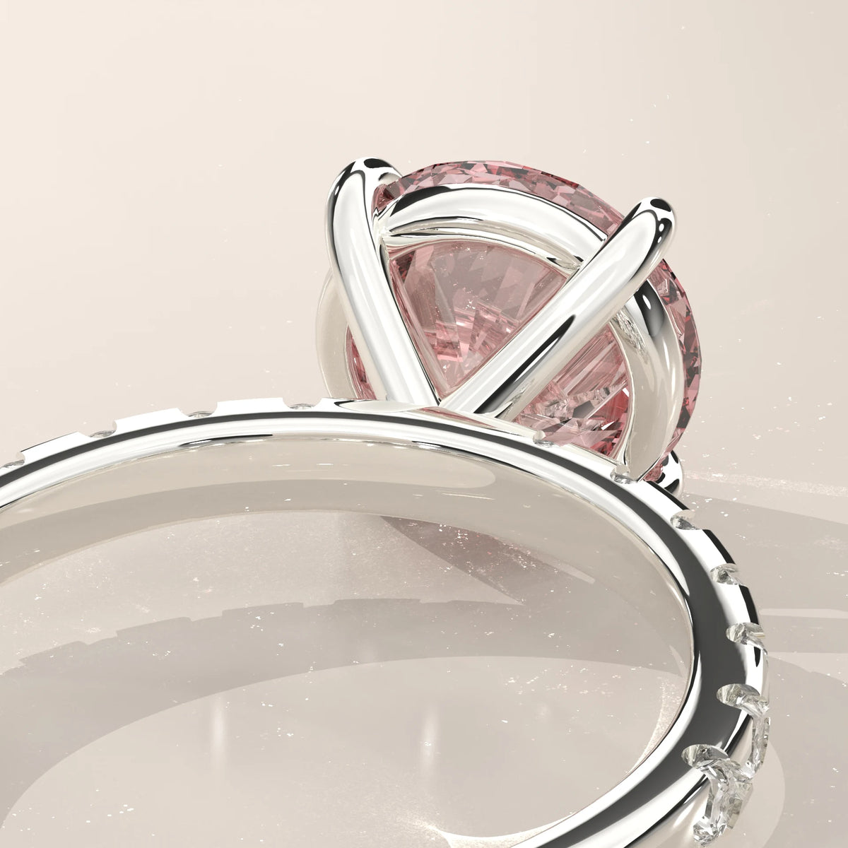Detail of the cross-over basket under the pink round lab grown diamond