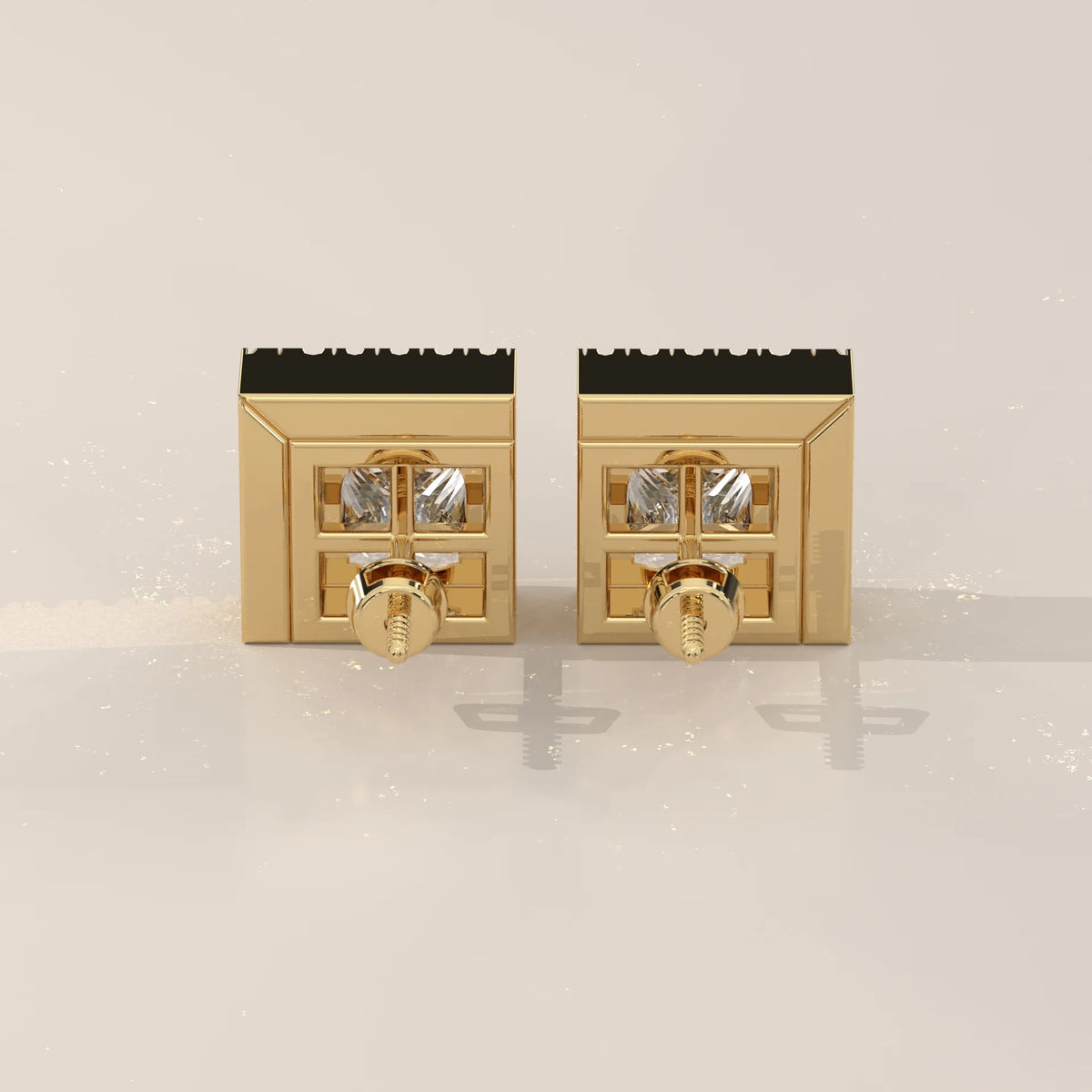 Princess Cut Bezel Lab Grown Diamond Studs with L Shaped Pave Edge in yellow gold, photographed head-on.