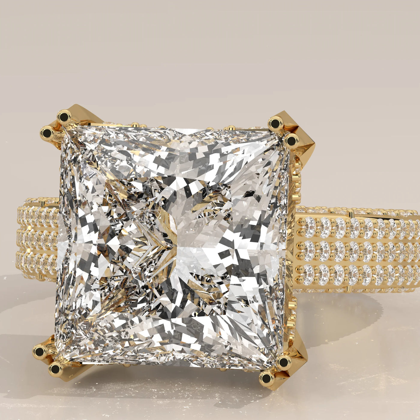 Princess cut diamond engagement ring with pave band in yellow gold.