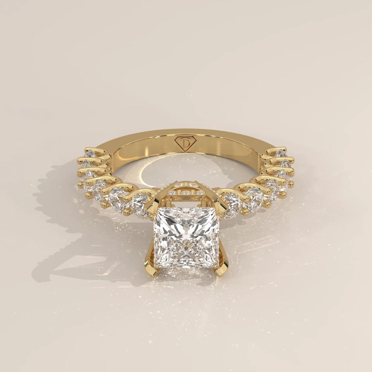 Princess Lab Grown Diamond Ring with Shared Claw Round Band in yellow gold, shown on a plain background.
