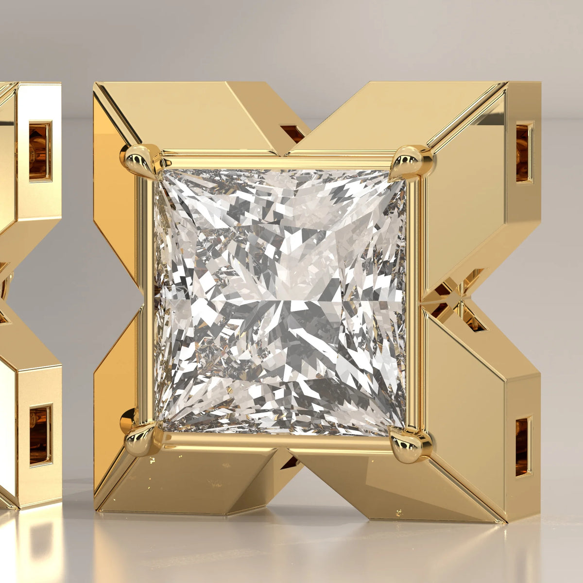 Princess Cut Lab Grown Diamond Studs in a Bold X Frame in yellow gold, photographed head-on.