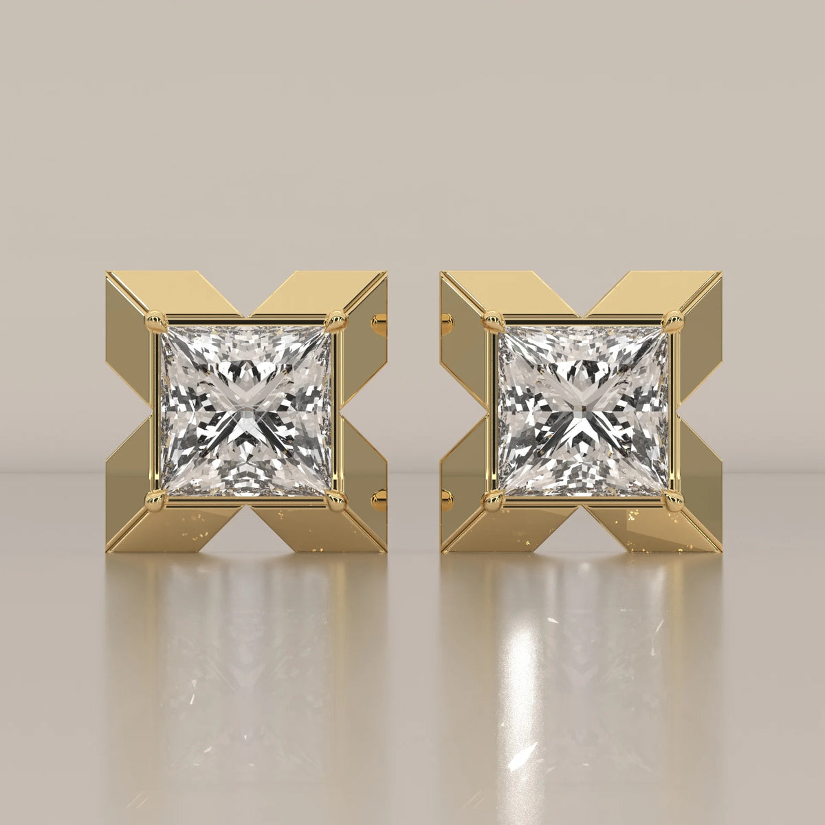 Princess Cut Lab Grown Diamond Studs in a Bold X Frame in yellow gold, shown from the front.