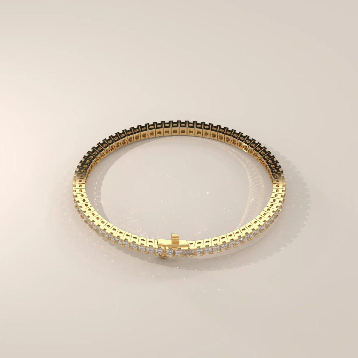 Princess Cut Lab Grown Diamond Tennis Bracelet in Box Settings in yellow gold, product photograph on a plain background.