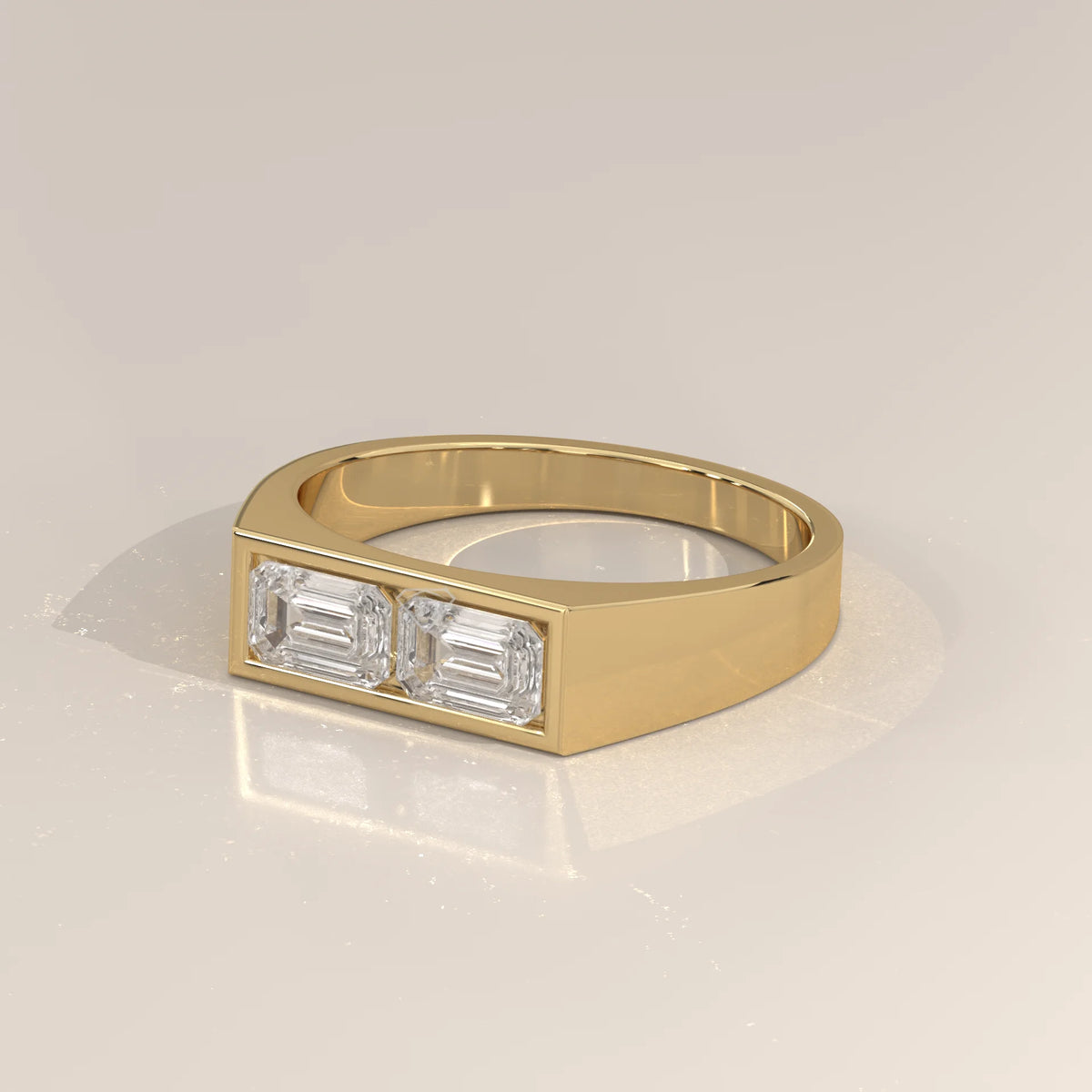 Emerald Cut Lab Grown Diamond Two Stone Signet Ring for Men in yellow gold, shown at an angle.