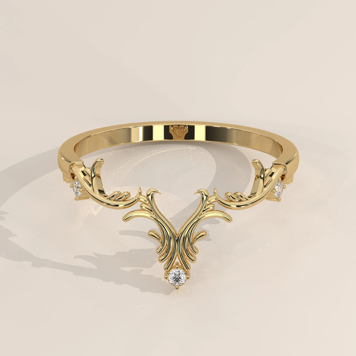 Yellow gold chevron band with carved gold scrollwork and round lab grown diamonds, shown from the front.