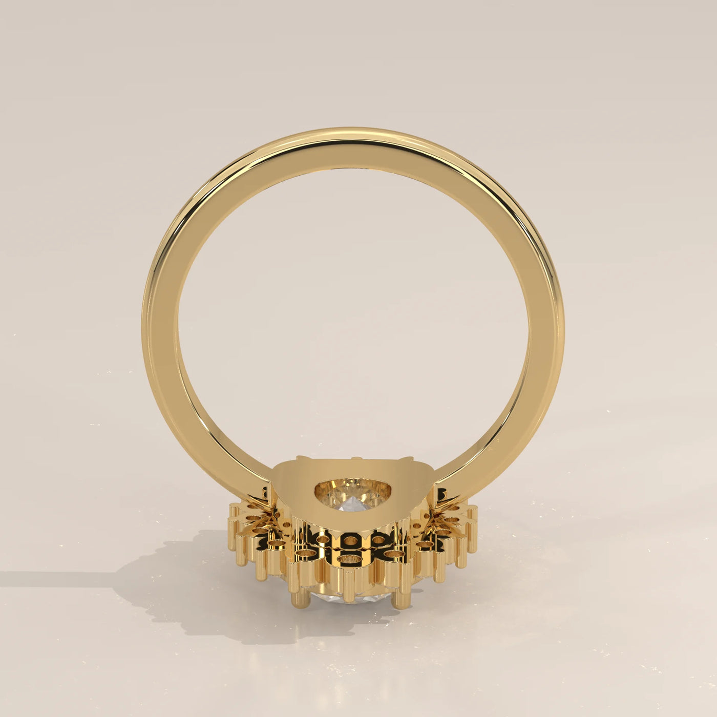 Gold ring with a clear stone, side view.