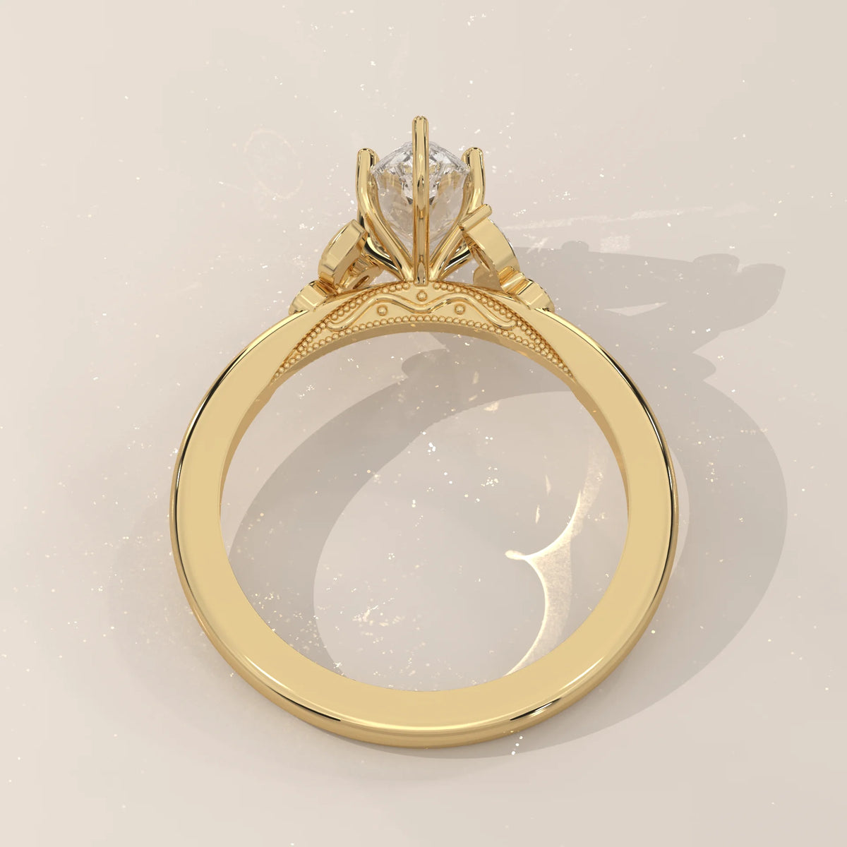 A 14k yellow gold ring with a central diamond and intricate detailing.