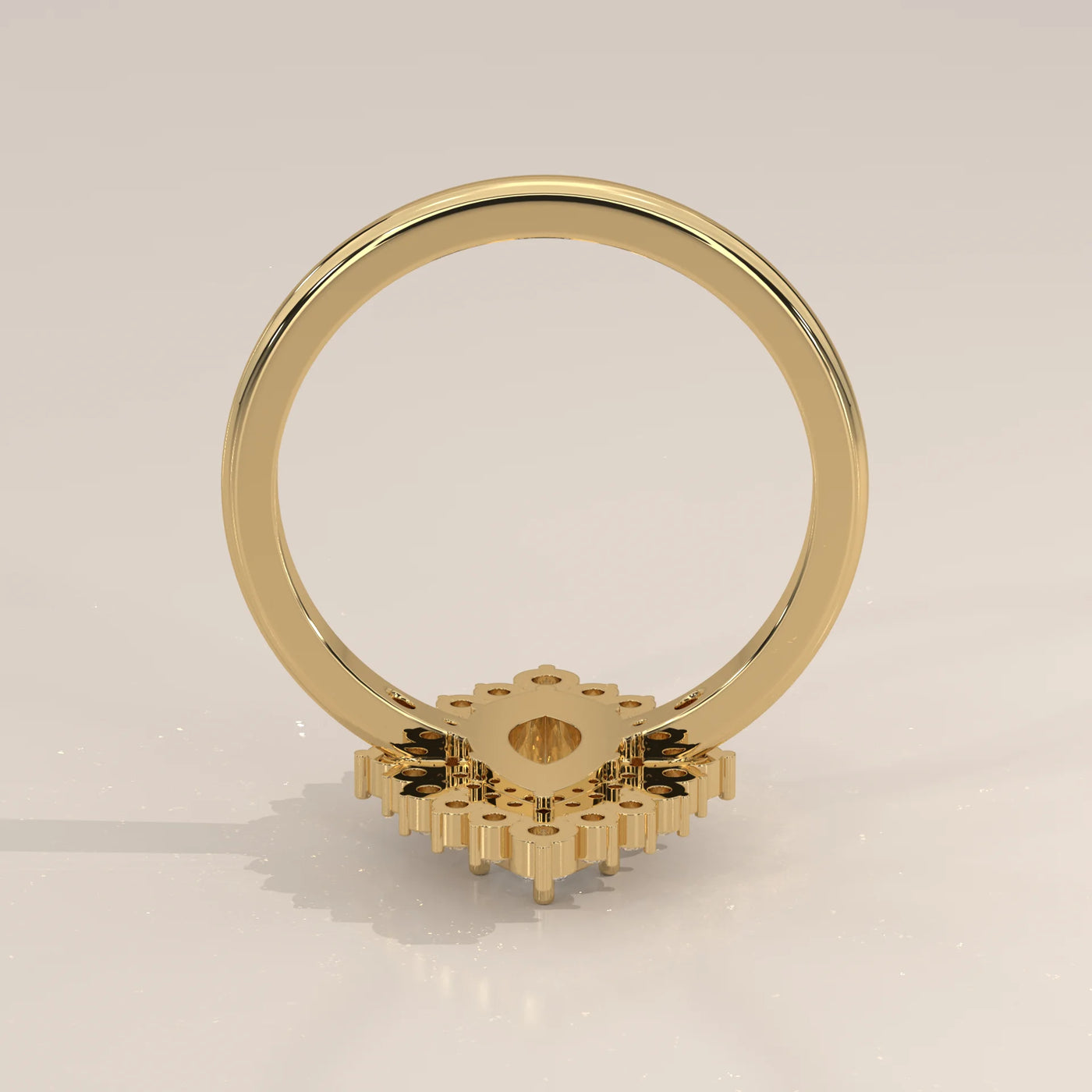 Back view of a geometric design gold ring with small stones.
