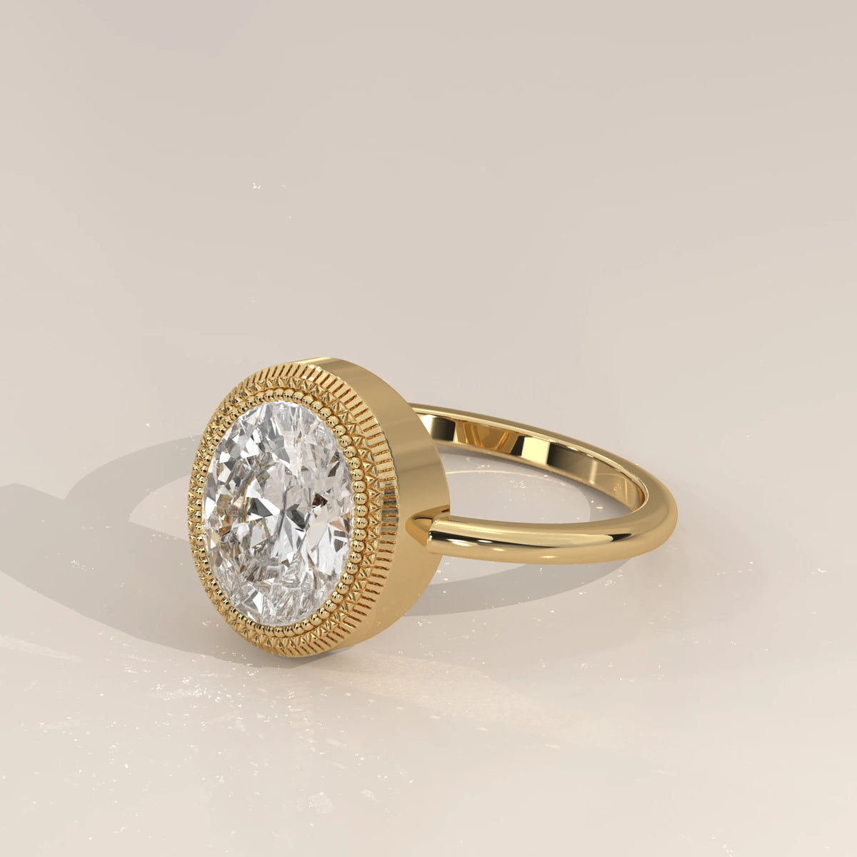 Oval Lab Grown Diamond Bezel Solitaire with Coin Edge Rim in yellow gold, shown from the side.