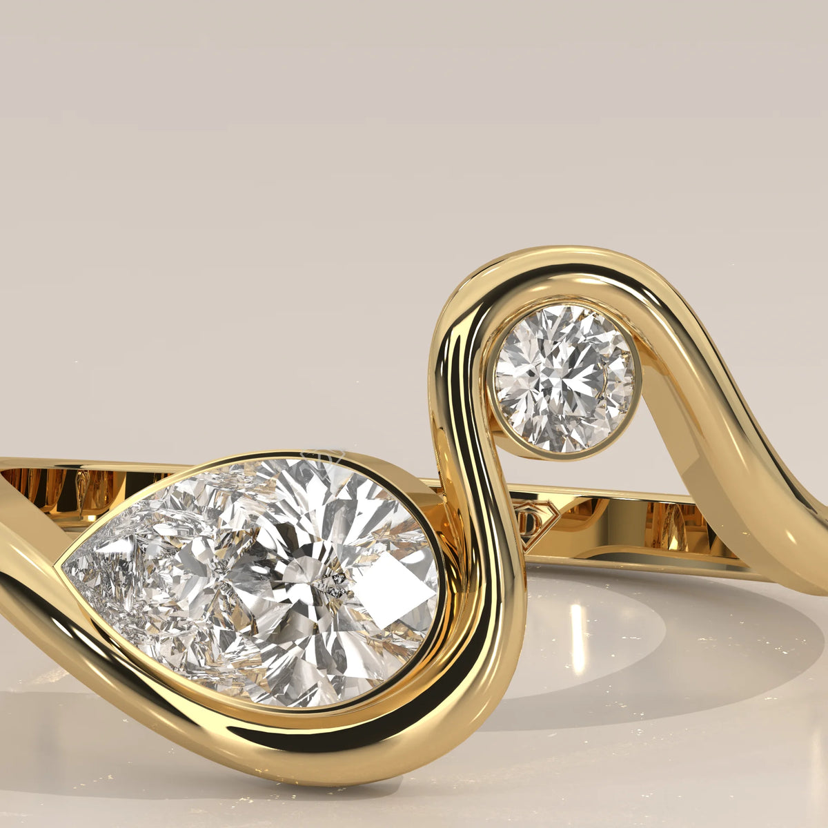 Pear Lab Grown Diamond Swirl Ring with Bezel Set Round Accent in yellow gold, photographed head-on.