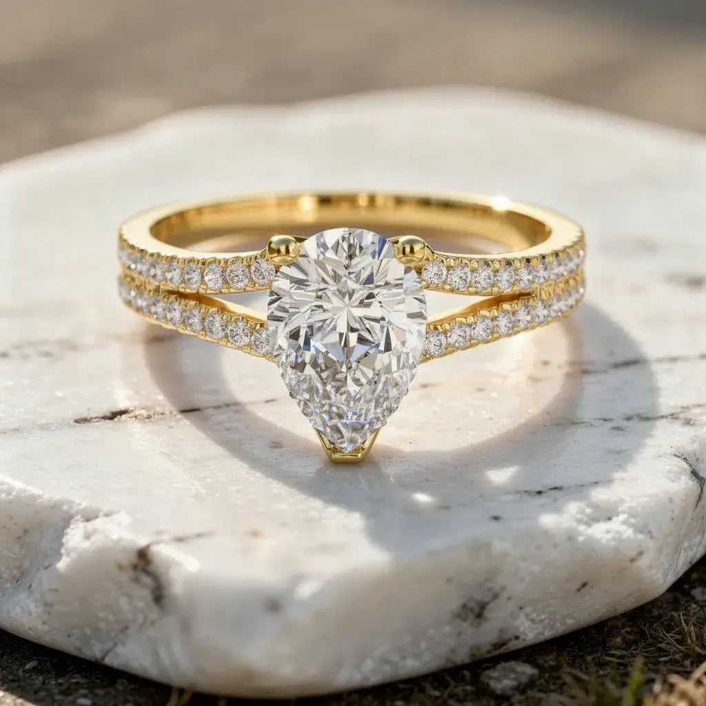 Front-view: Pear Cut Diamond Ring with Split Shank Setting in 14k Yellow Gold - Lab Grown - Driona Jewels