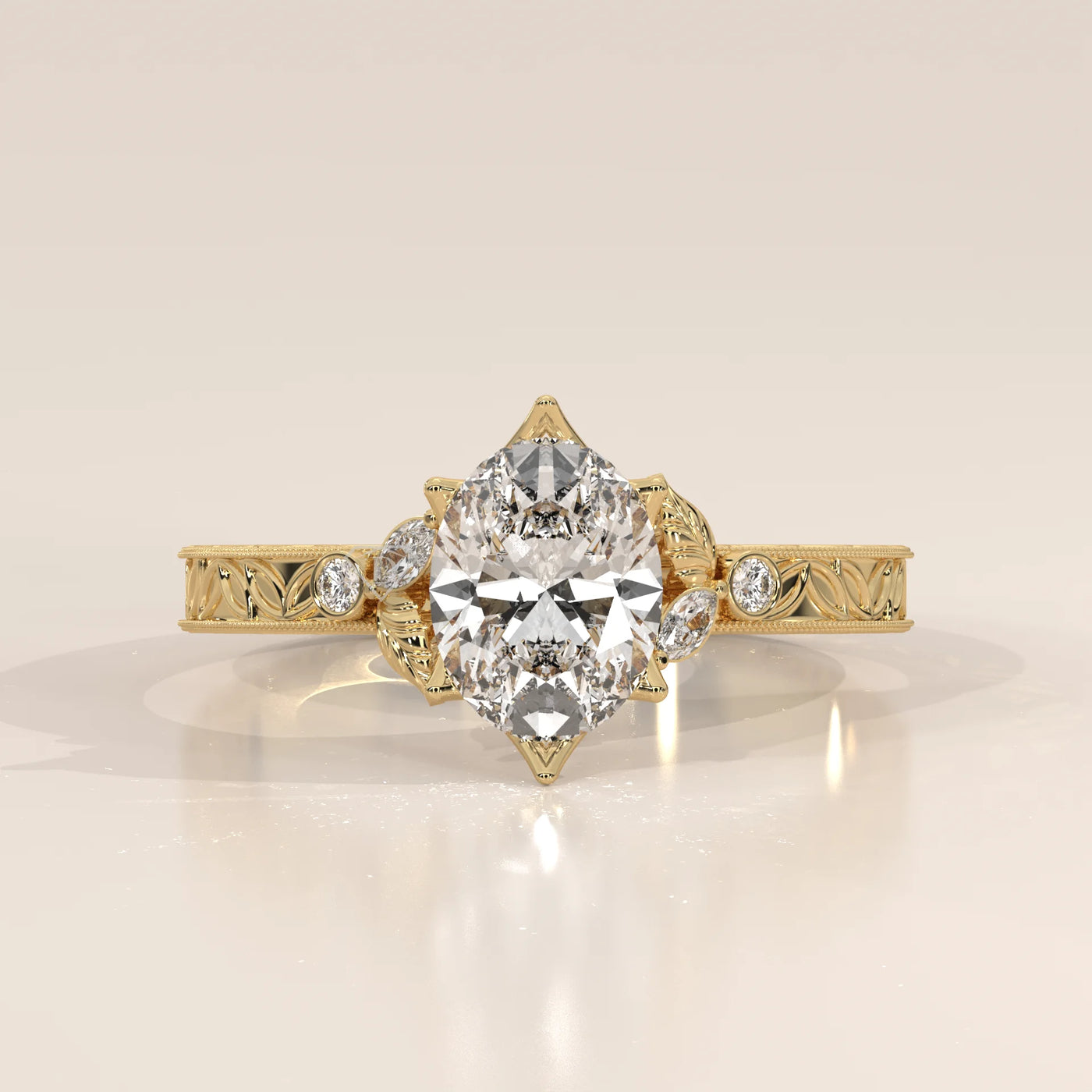 Pear shaped diamond engagement ring in yellow gold with intricate detailing.