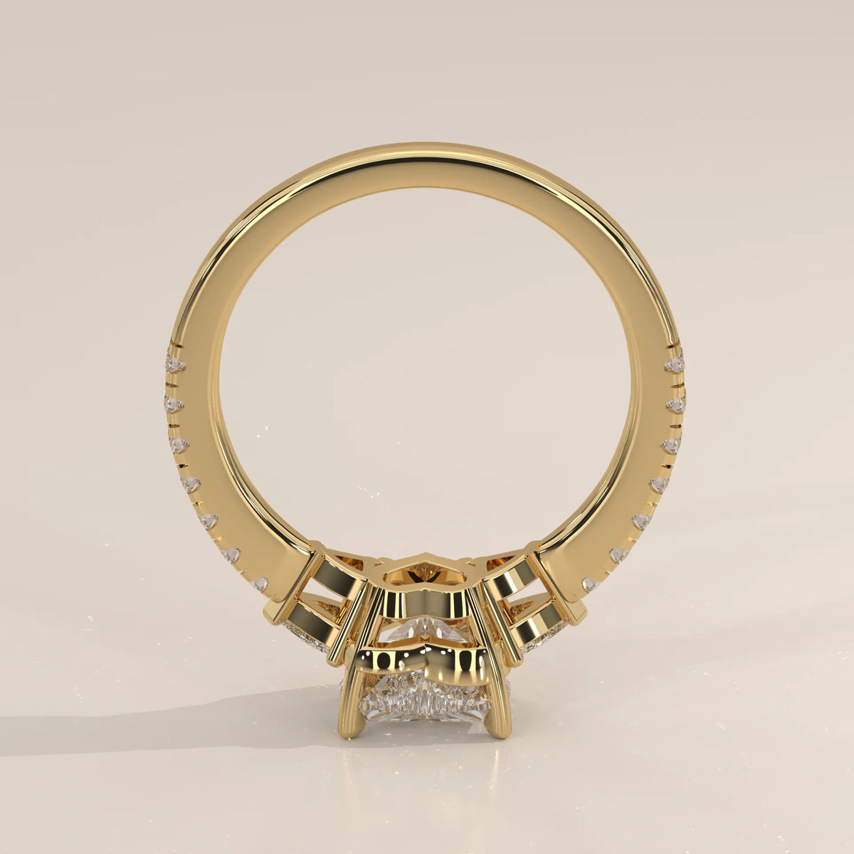 Heart Lab Grown Diamond Three Stone Ring with Trillion Sides in yellow gold, shown at an angle.