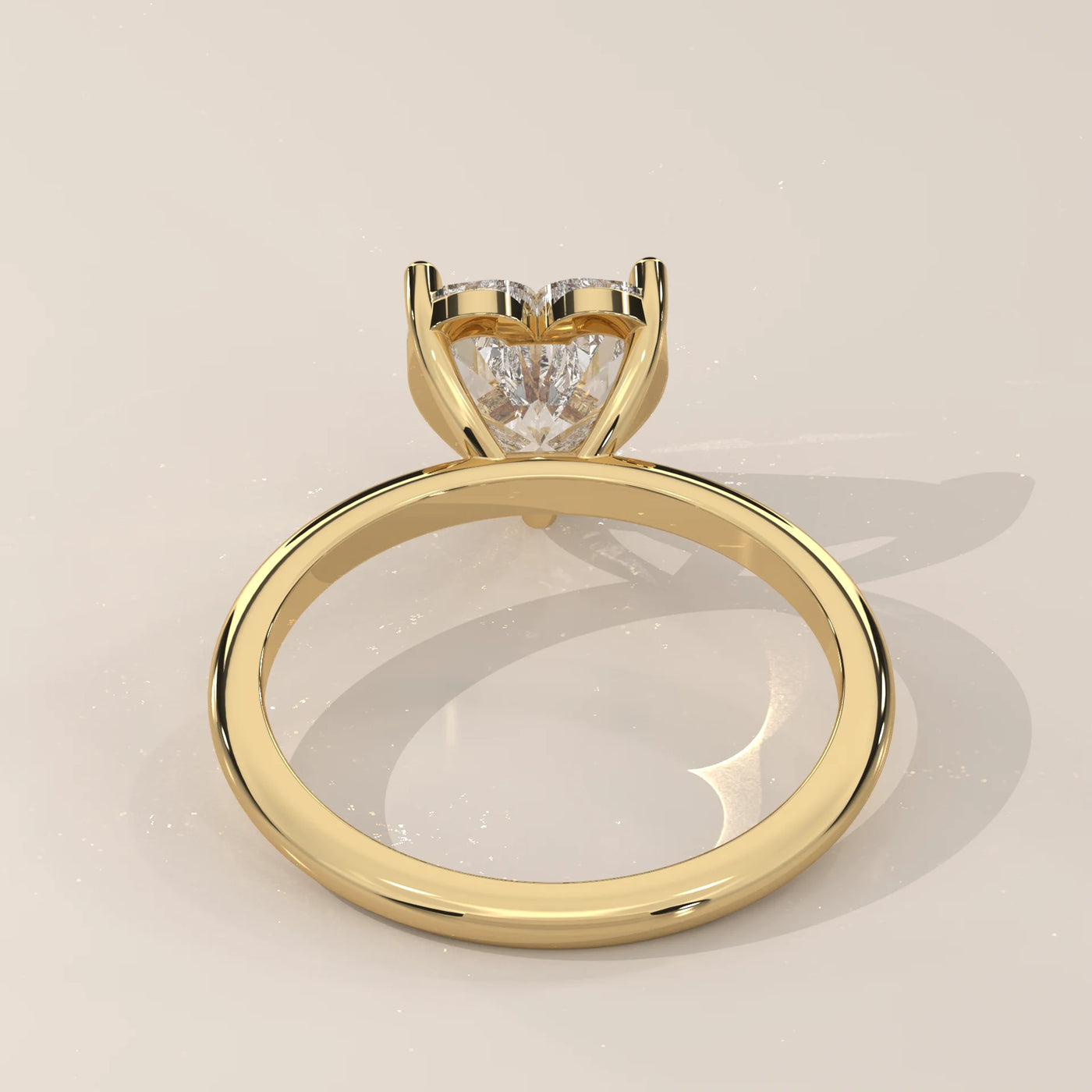 Yellow gold ring with a princess-cut diamond and pavé band.