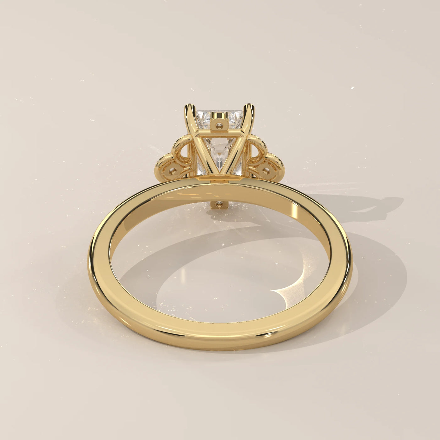 Princess cut diamond ring in 14k yellow gold.